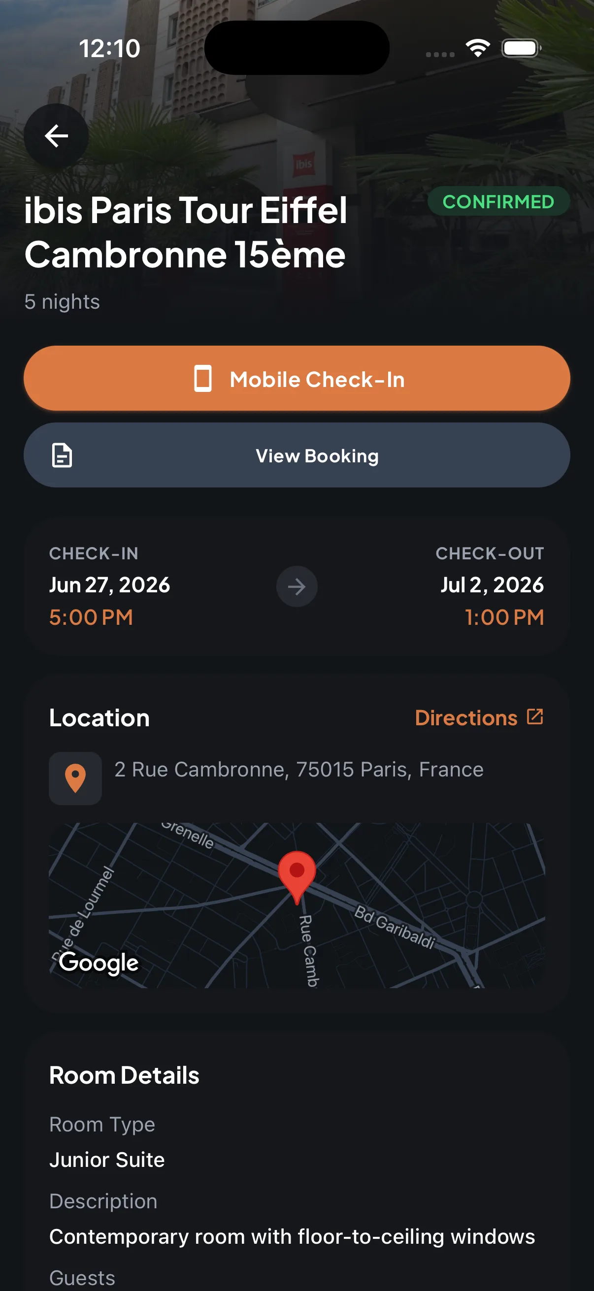 Trip7 hotel detail view with mobile check-in, booking actions, and location for a confirmed stay